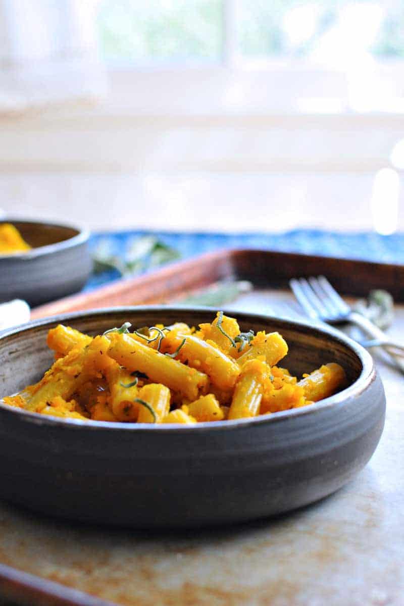 A savory and surprisingly hearty vegan/vegetarian pasta ready in about 30 minutes (with GF variation). Find the full recipe at www.thepigandquill.com. #vegan #vegetarian #glutenfree #pasta #recipe #squash #fall