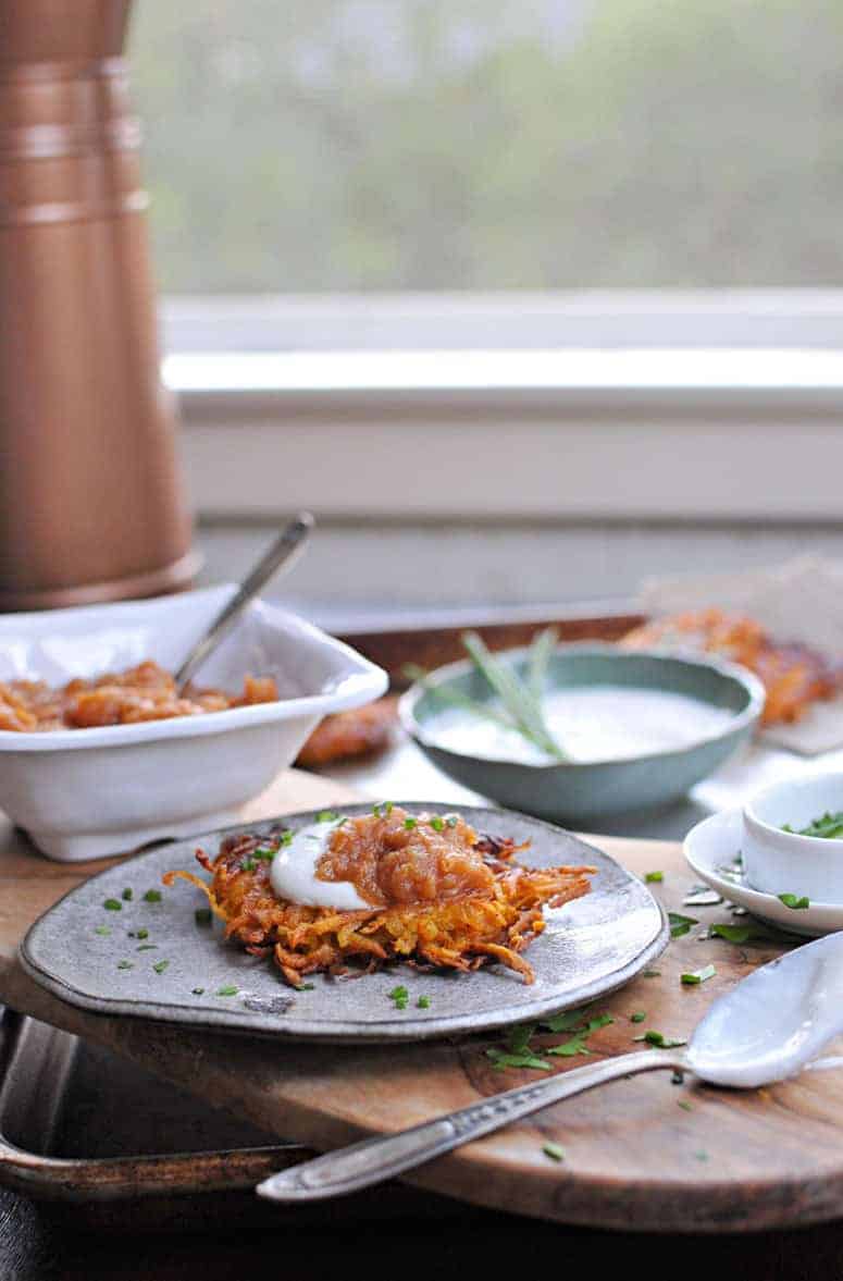 Perfect for entertaining! Crisp potato pancakes with two simple toppings that make great recipes on their own, too. Sweet, spicy, smoky, creamy! Full recipes at www.thepigandquill.com // #holiday #hanukkah #recipe #glutenfree #vegetarian