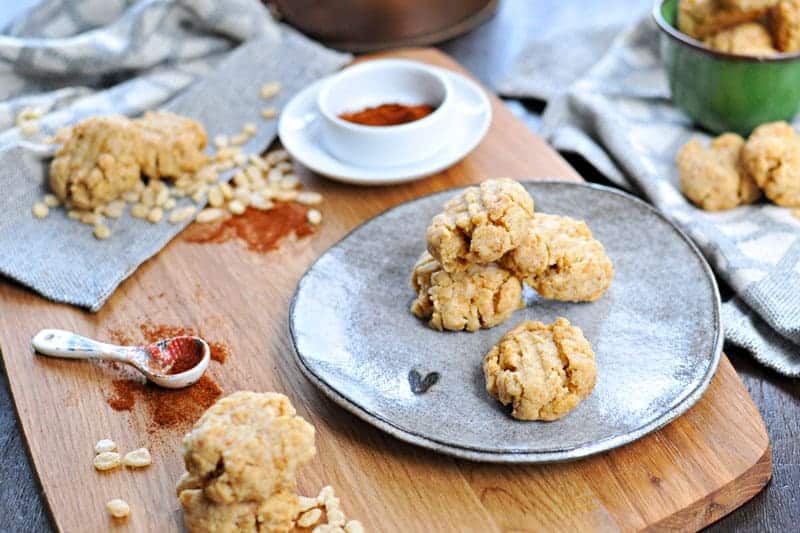 Super simple cheese crisps made with crisped rice cereal!! Great for cheese plates or party trays. Full recipe at www.thepigandquill.com. #partyfood #NYE #recipe #cheese #snacks