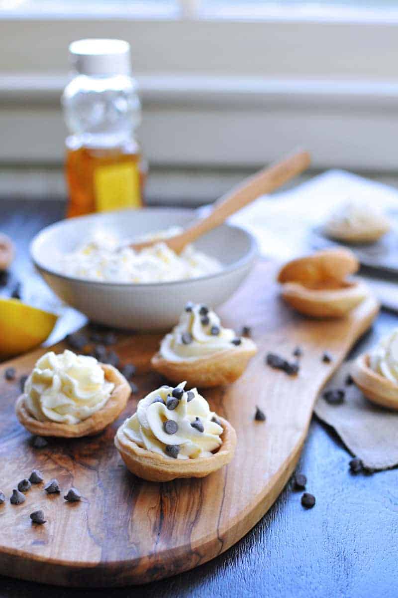 mini meyer lemon cannoli cream tartlets with honey + chocolate chips | via thepigandquill.com