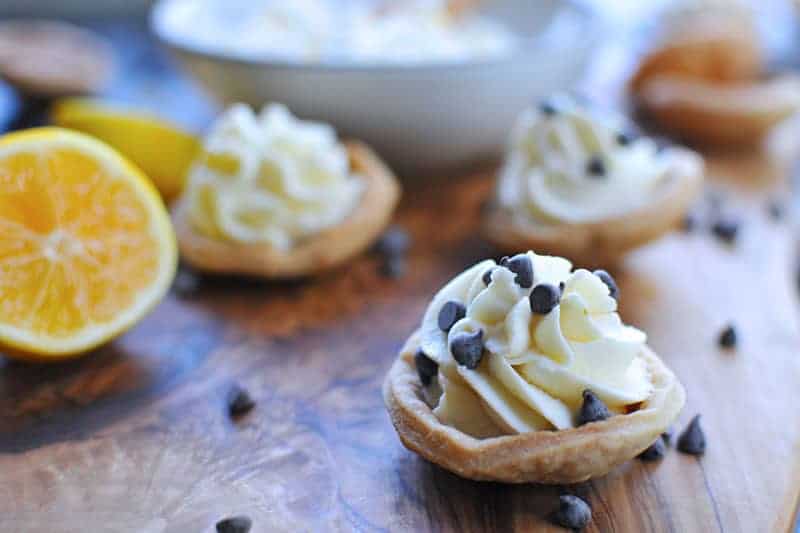 mini meyer lemon cannoli cream tartlets with honey + chocolate chips | via thepigandquill.com