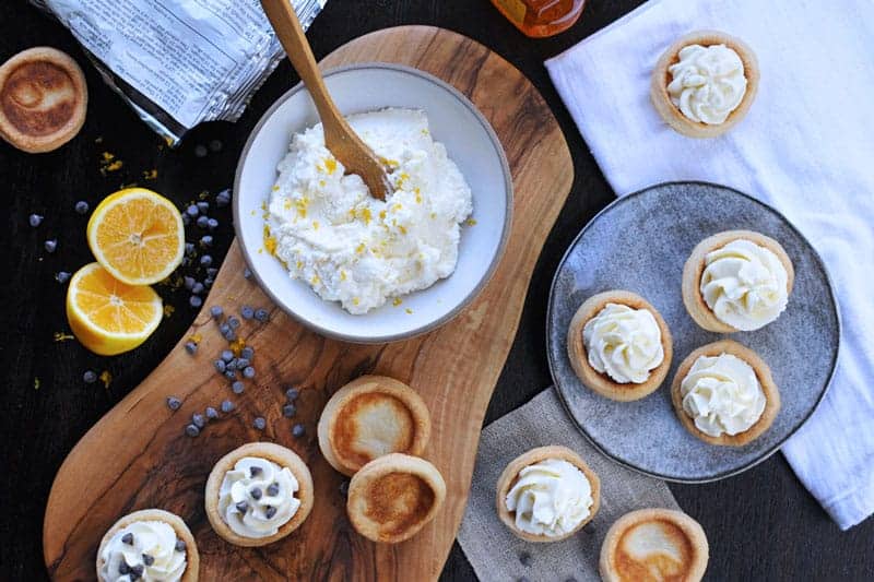 mini meyer lemon cannoli cream tartlets with honey + chocolate chips | via thepigandquill.com