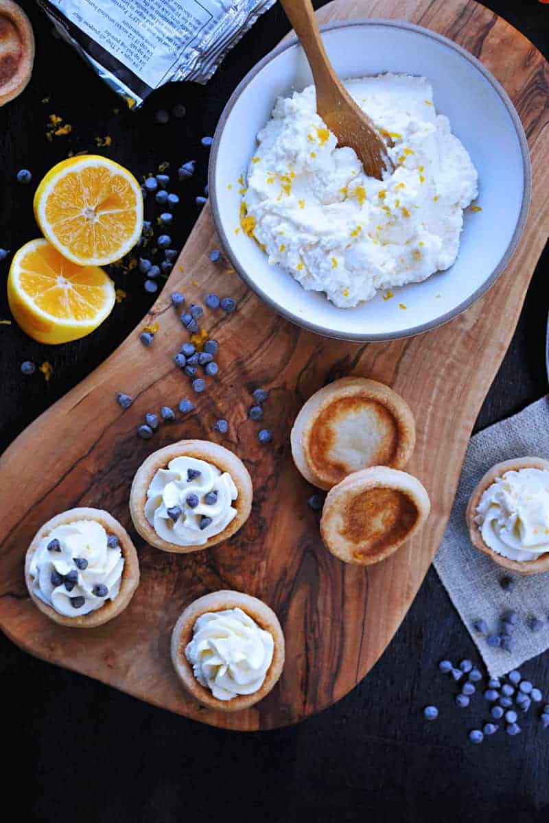 mini meyer lemon cannoli cream tartlets with honey + chocolate chips | via thepigandquill.com