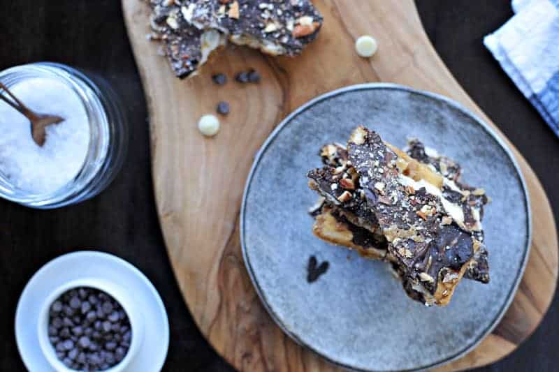 Salted Double Chocolate Cracker Crack (Saltine Toffee) with Roasted Almonds | via thepigandquill.com #recipe #sweets #candy #chocolate