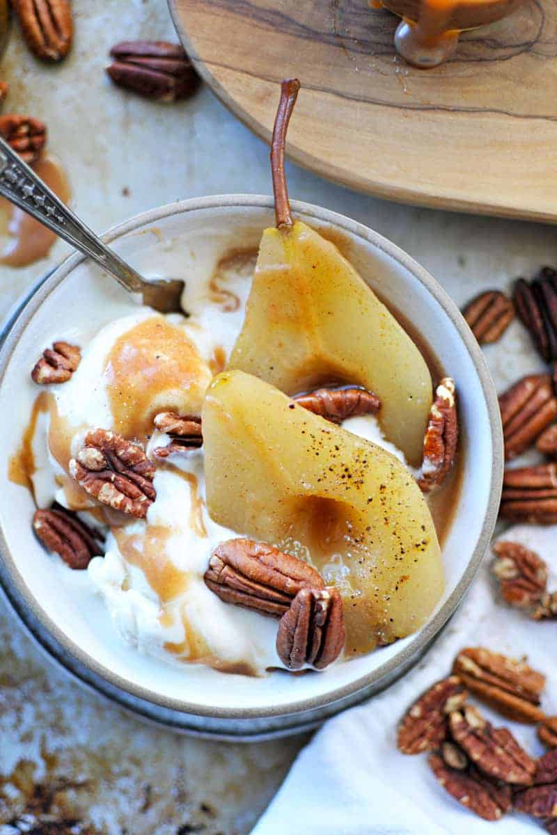 Cider Poached Pears with Apple Cider Caramel + Toasted Pecans recipe (via thepigandquill.com) #vegan #sweets #dessert #caramel #fall