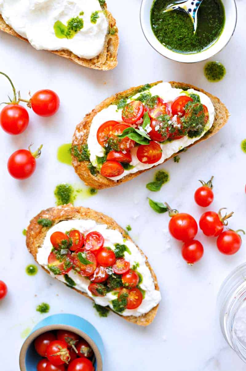 Whipped Ricotta Toast Two Ways recipe: Tomatoes, Basil Oil, Sea Salt // Summer Fruit, Honey, Black Pepper (via thepigandquill.com) #breakfast #brunch #summer #vegetarian