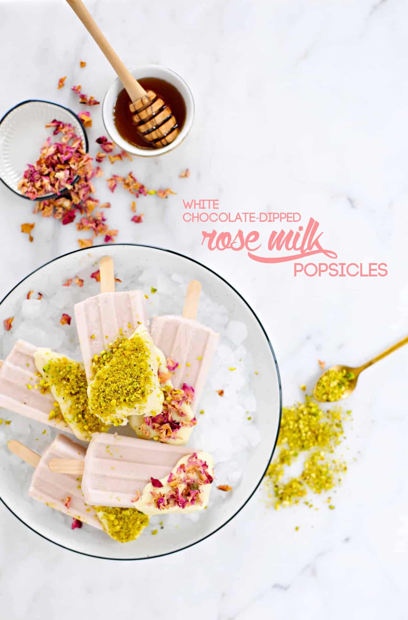 White Chocolate Dipped Rose Milk Popsicles recipe (via thepigandquill.com) #summer #dessert #pistachios