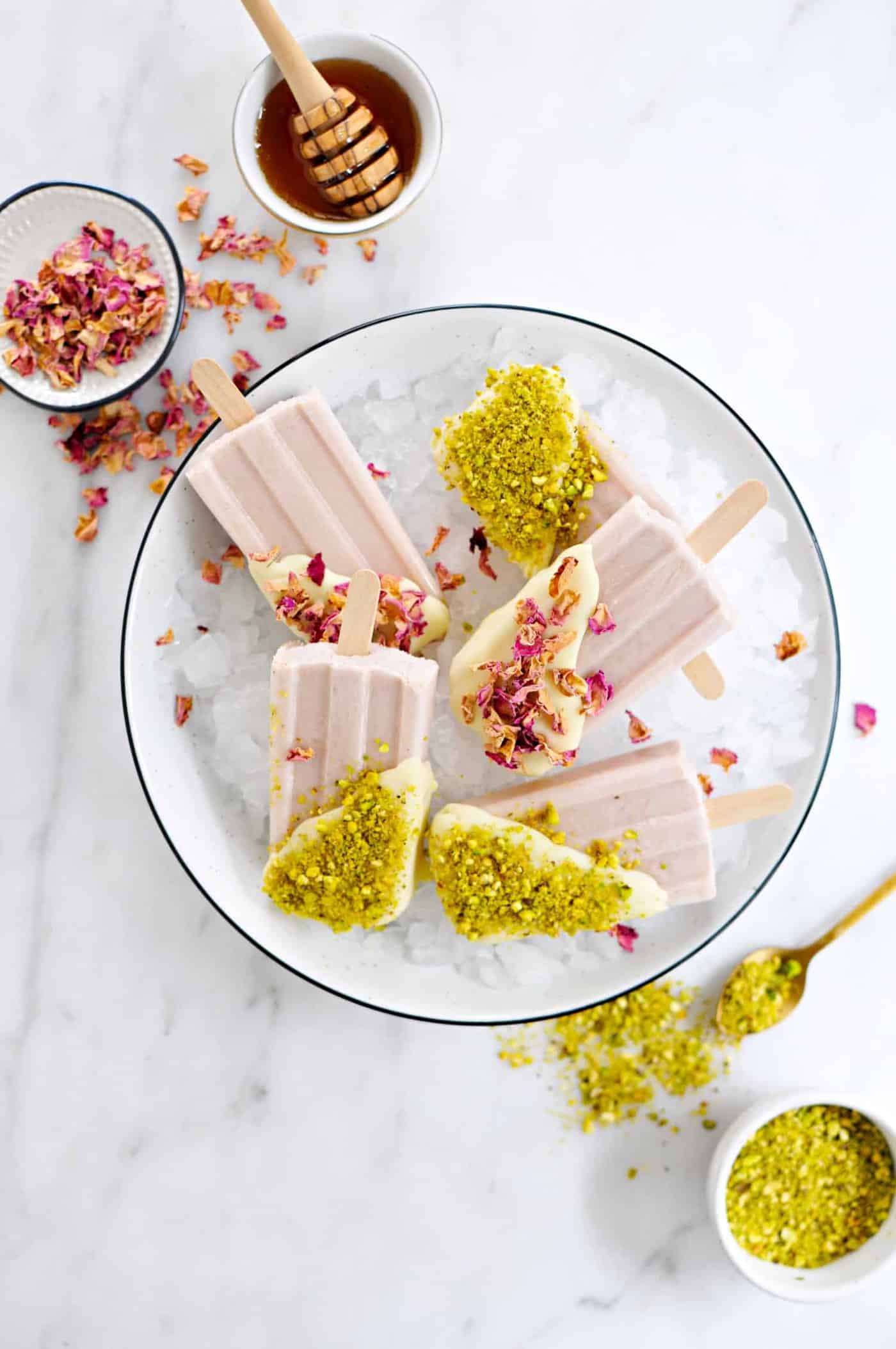 White Chocolate Dipped Rose Milk Popsicles recipe (via thepigandquill.com) #summer #dessert #pistachios