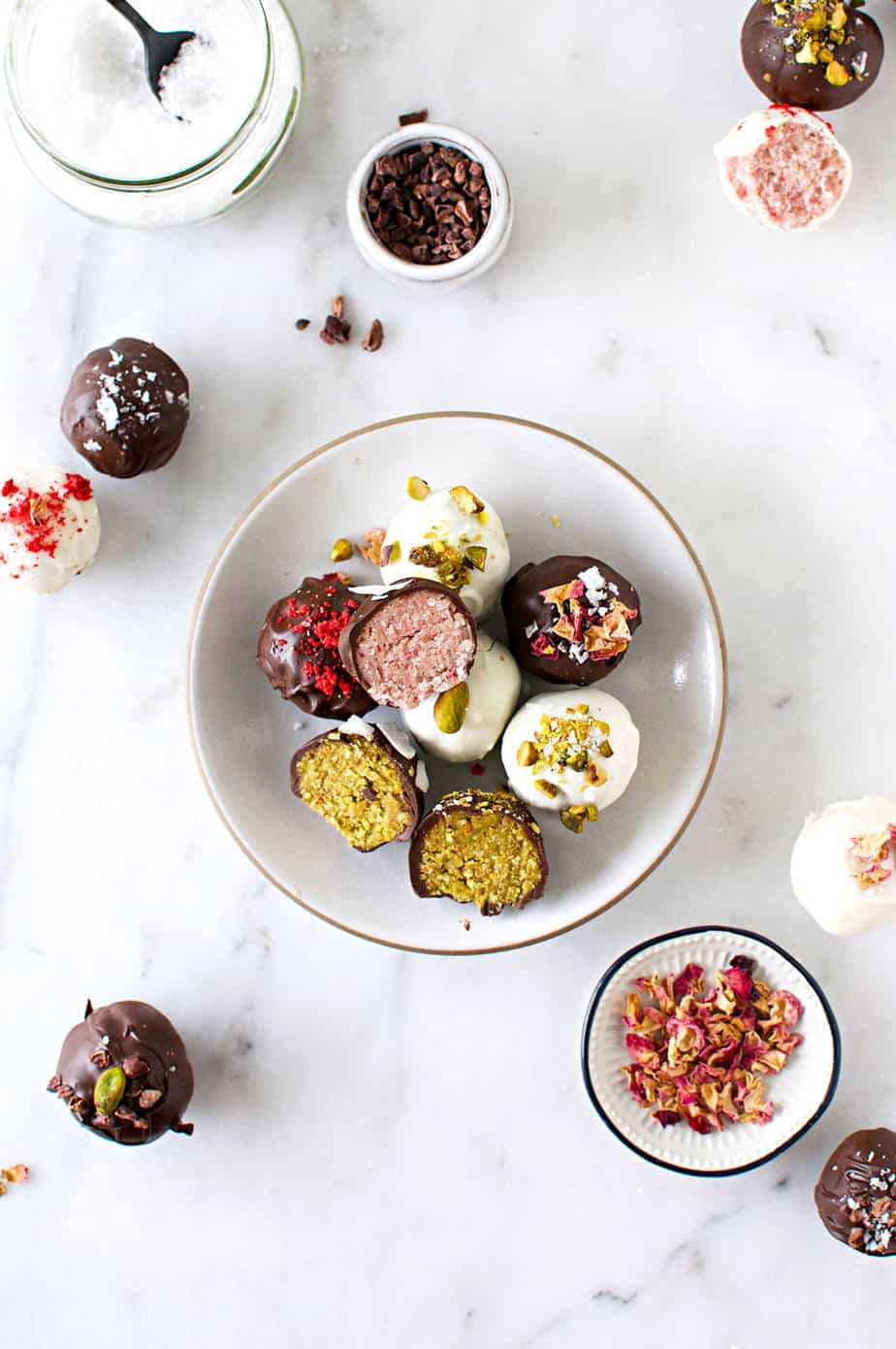 Vegan Coconut Truffles two ways: Vegan Rose Truffles and Vegan Pistachio Truffles recipe (via thepigandqill.com) #glutenfree #candy #sweets #valentinesday #chocolate #coconutbutter