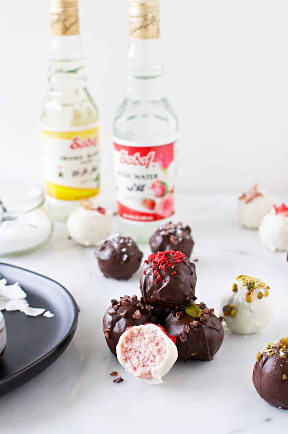 Vegan Coconut Truffles two ways: Vegan Rose Truffles and Vegan Pistachio Truffles recipe (via thepigandqill.com) #glutenfree #candy #sweets #valentinesday #chocolate #coconutbutter