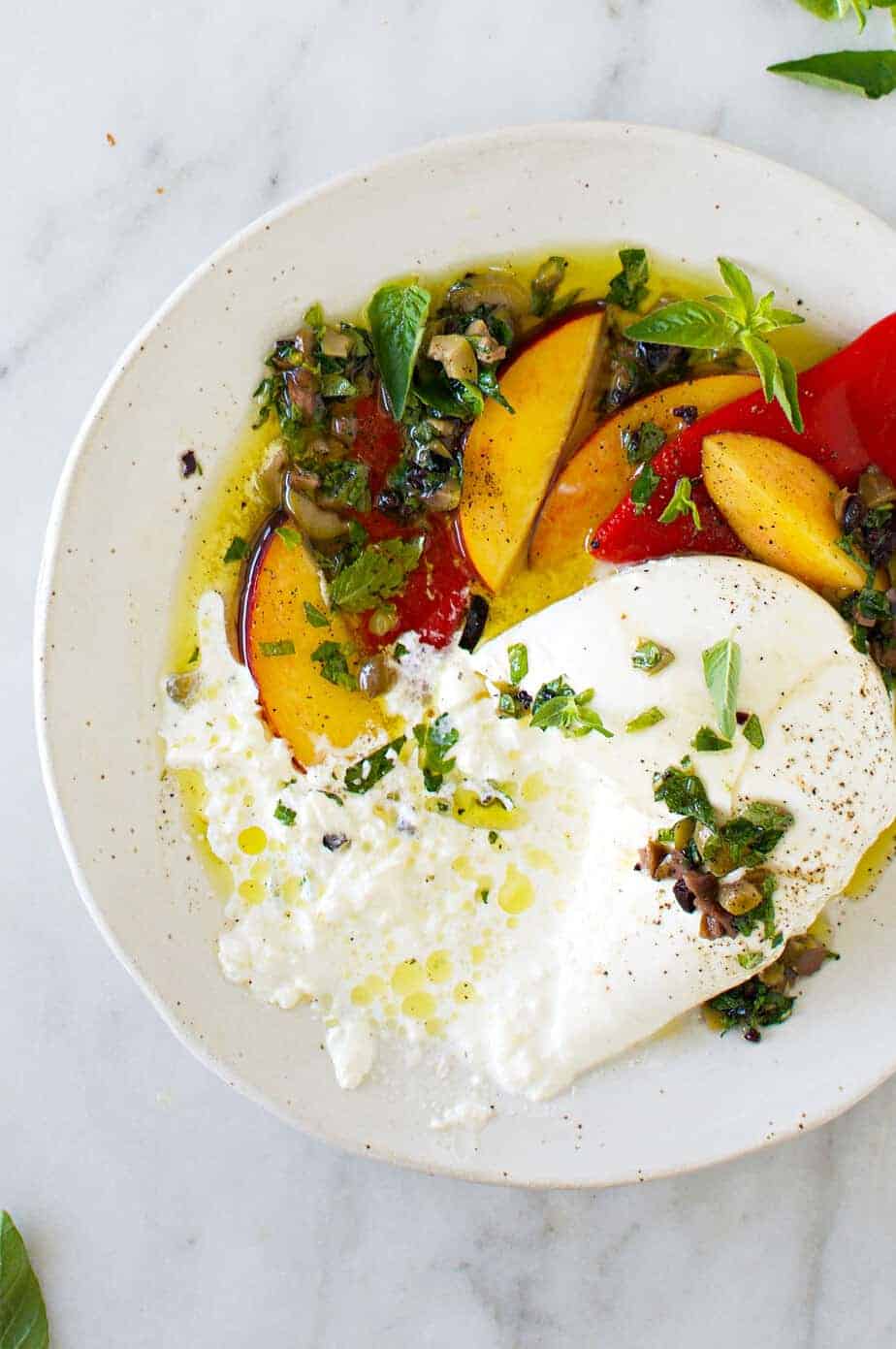 Burrata Appetizer with Mediterranean Honey Herb Oil, Nectarines + Roasted Peppers recipe (via thepigandquill.com) 