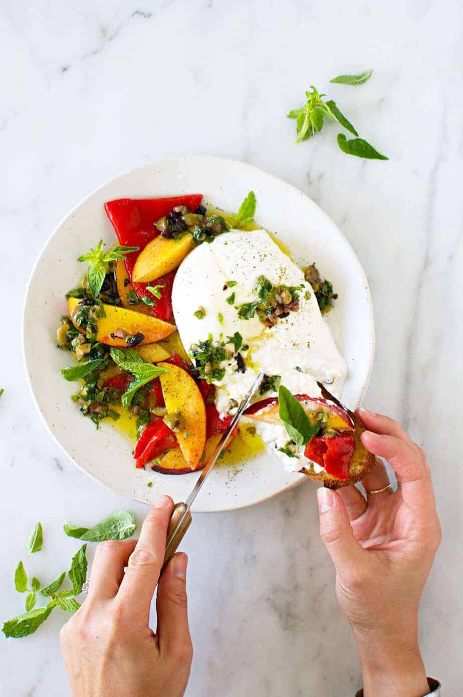 Burrata Appetizer with Mediterranean Honey Herb Oil, Nectarines + Roasted Peppers recipe (via thepigandquill.com) 