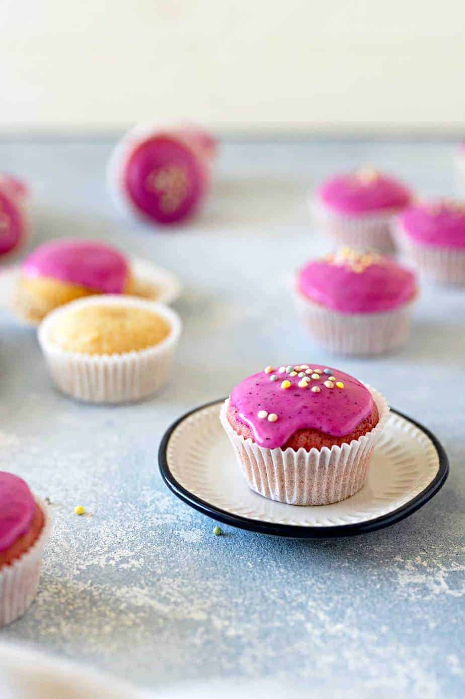 Pink Mini Vegan Donut Muffins recipe via thepigandquill.com #quarantinebaking #baking #eggfree #dairyfree