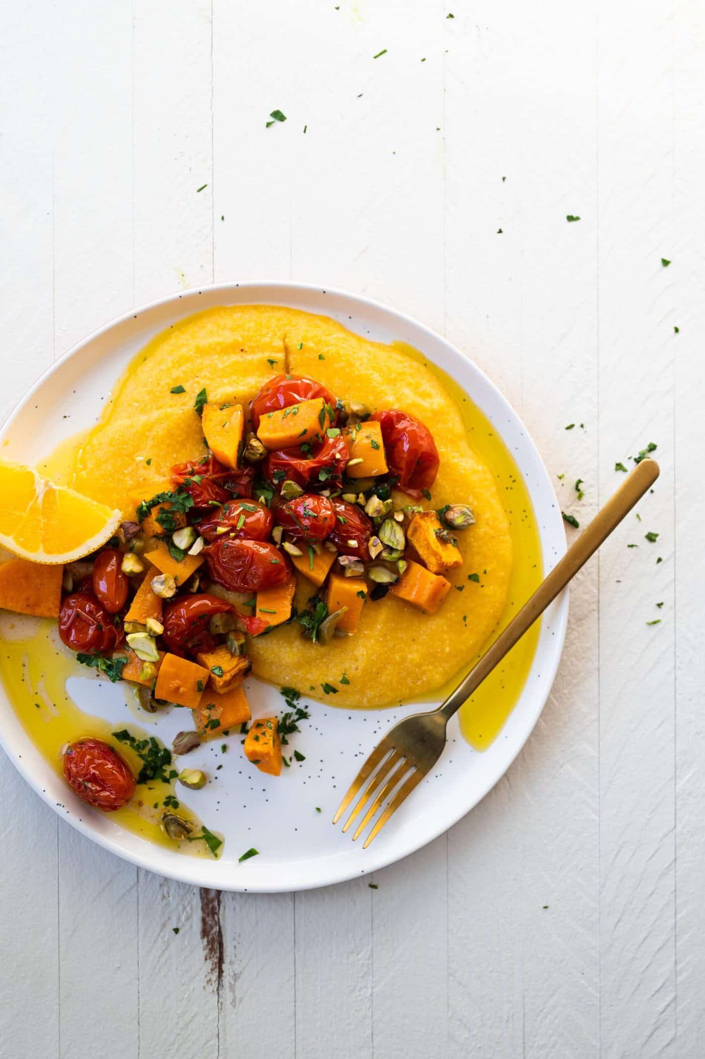 Vegan Grits Bowls with Roasted Sweet Potatoes and Tomatoes -- an easy weeknight vegan sheetpan meal (via thepigandquill.com)