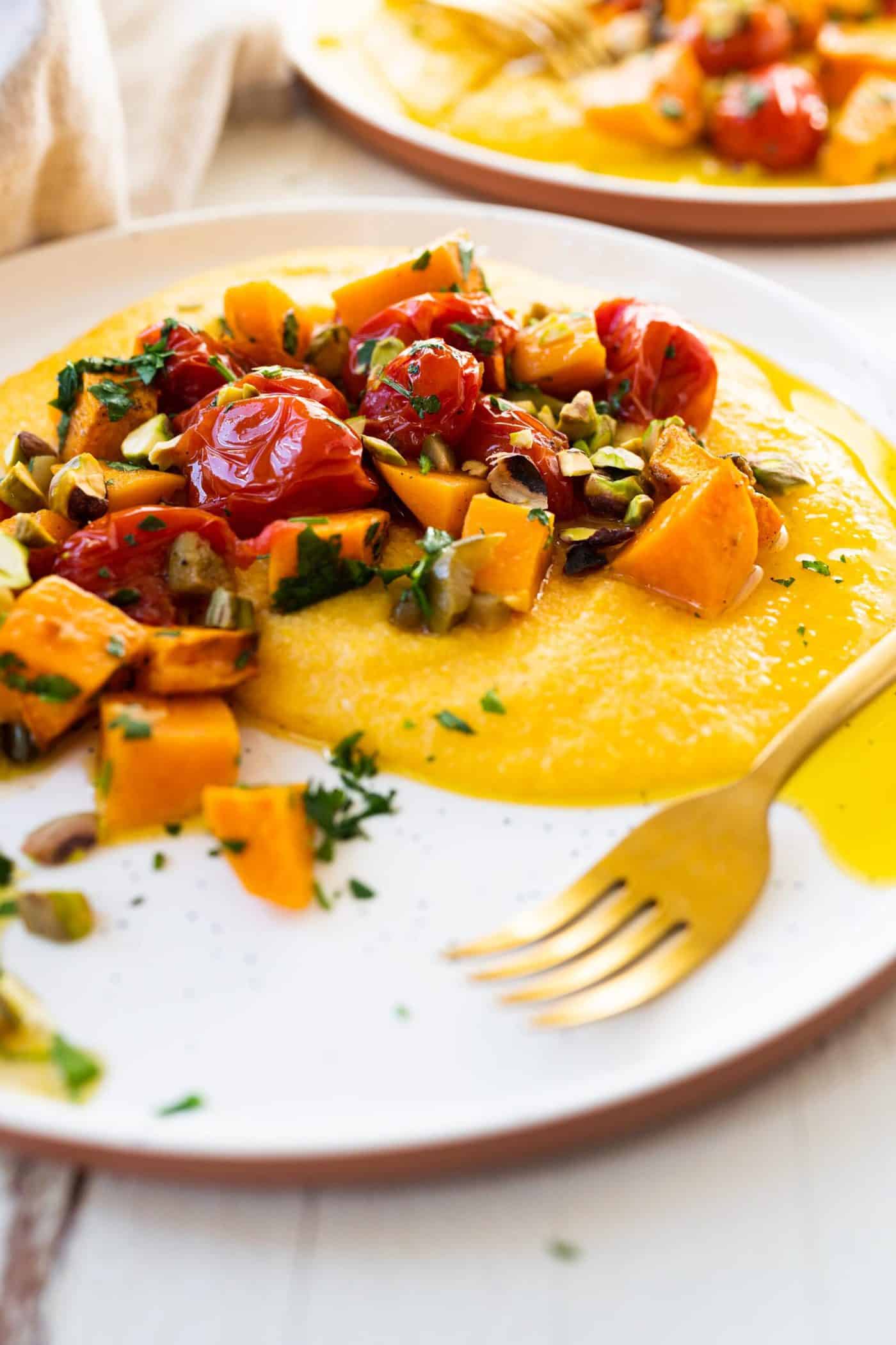 Vegan Grits Bowls with Roasted Sweet Potatoes and Tomatoes -- an easy weeknight vegan sheetpan meal (via thepigandquill.com)
