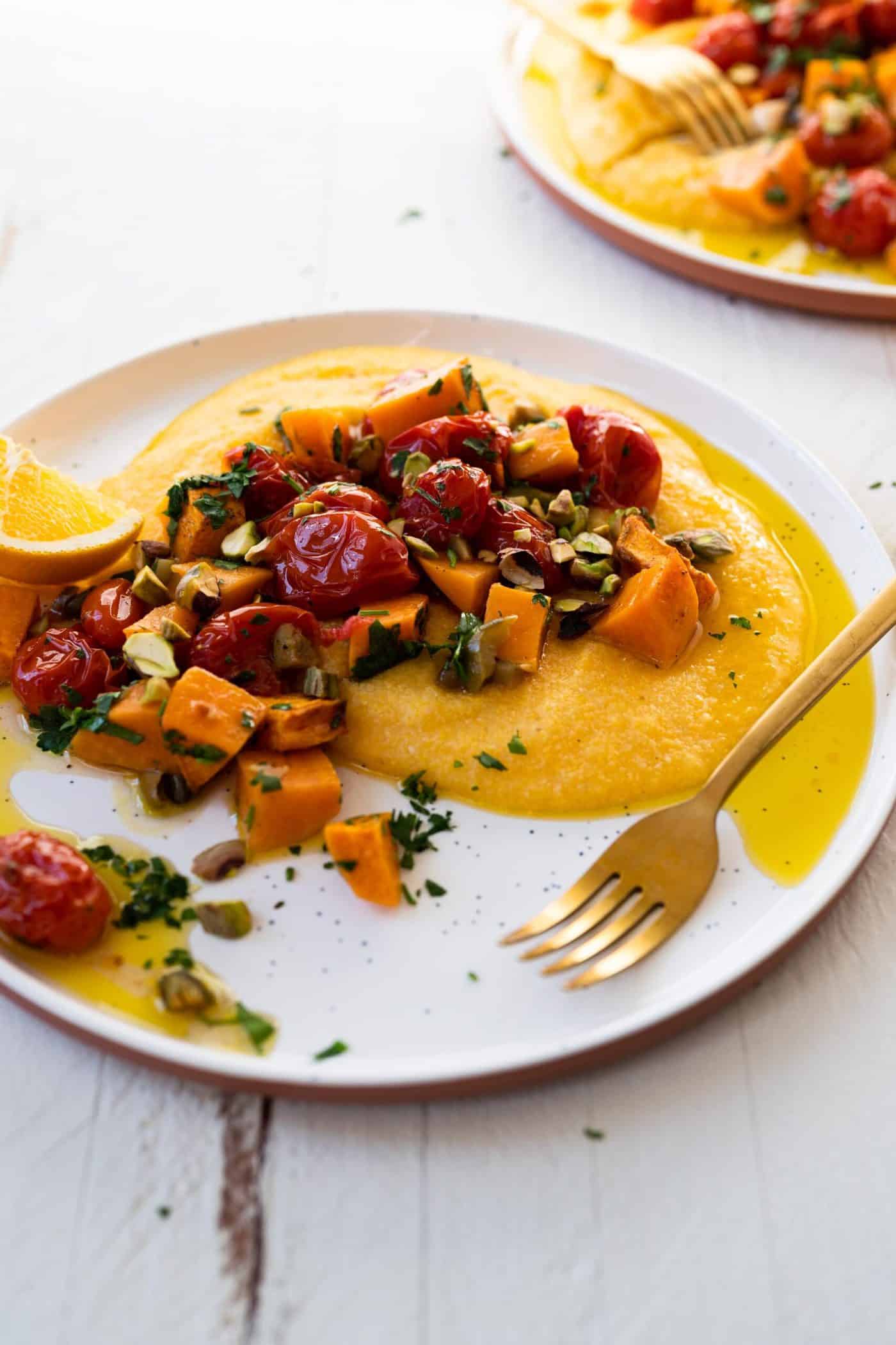 Vegan Grits Bowls with Roasted Sweet Potatoes and Tomatoes -- an easy weeknight vegan sheetpan meal (via thepigandquill.com)